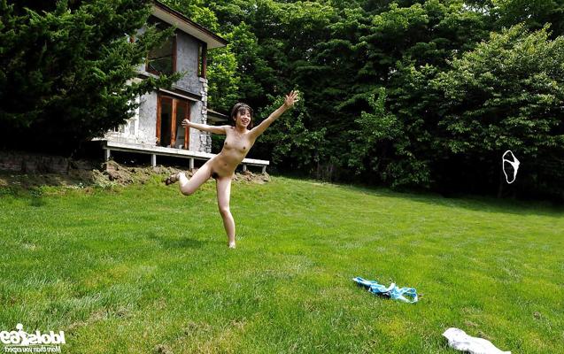 16P Naked asian cutie with tiny tits and hairy pussy having fun outdoor