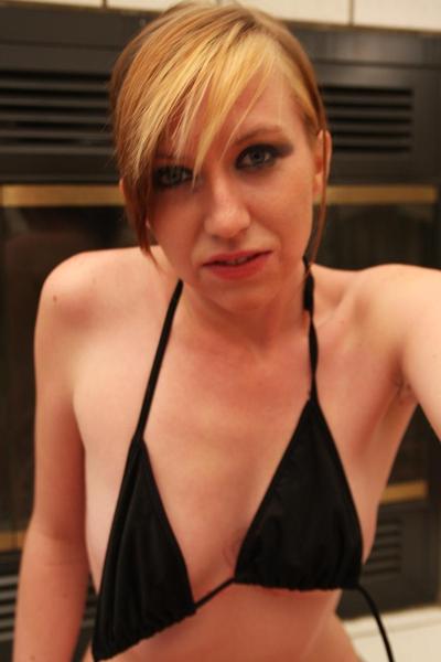 20P Amateur girlfriend Kacie shows her hot body while changing by the fireplace