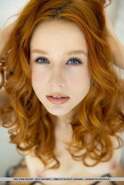18P Hot redheaded teen Lila Rouge removes her lingerie in black hosiery