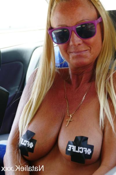 15P Slutty Spanish wife Natalie K strips her shirt and poses topless outside