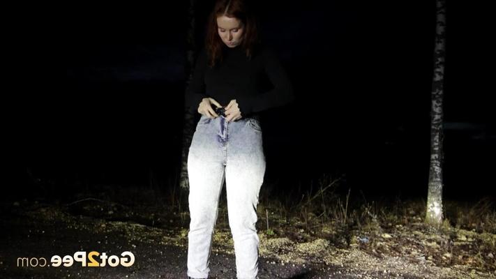 15P Redheaded girl Nikky B takes a badly needed pee on a road at night