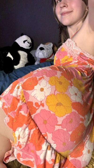 11P Sexy amateur teen Teensy Bella poses seductively in her nightgown