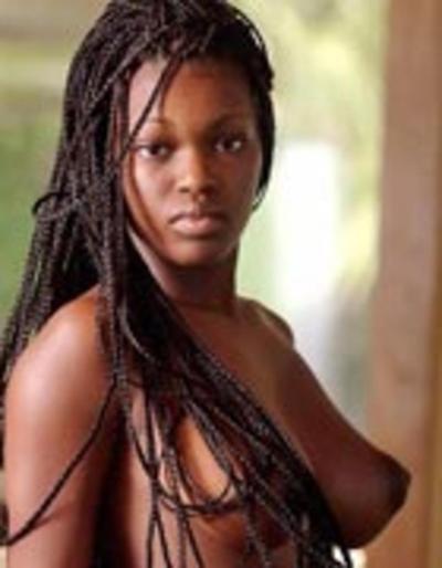 20P Ebony teen with grand boobs and long dreads Deserea poses naked outdoors