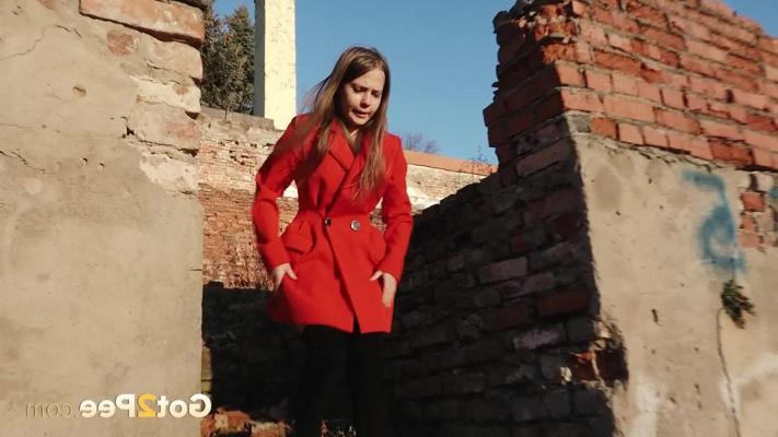 15P Caucasian girl Nastya takes a piss behind the remnants of a brick house