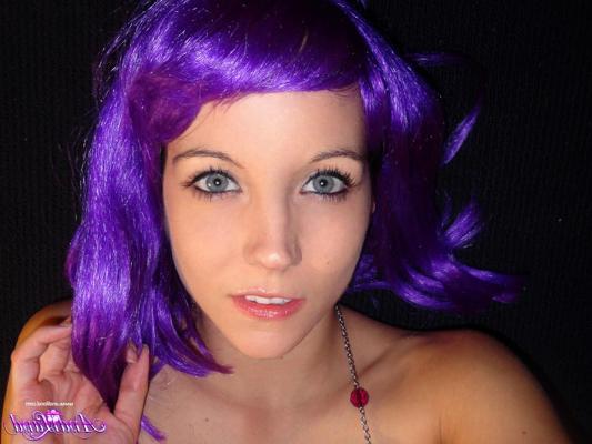 15P Cute teen Andi Land sports purple hair while taking semi-nude selfies