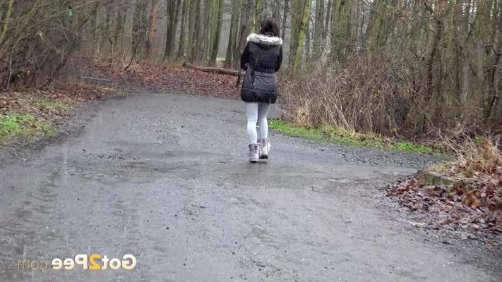 15P Victoria Daniels takes an urgent piss on a roadway in winter boots