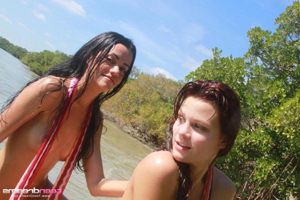 20P Petite lesbian babes Layla & Gia fool around while topless at the beach