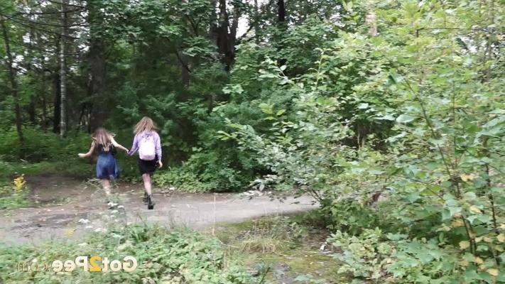 15P Naughty girl Sasha takes a pee in the countryside while her girlfriend watches