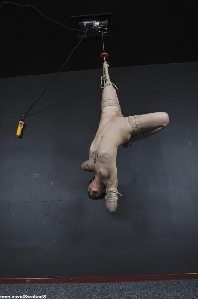 16P Tattooed female is bound with roped and suspended from the ceiling
