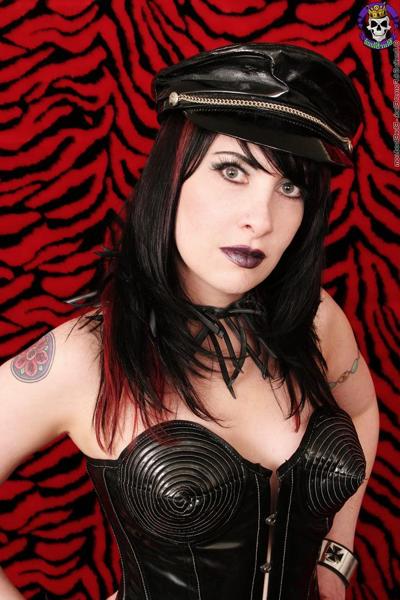 15P Solo girl Serena Toxicat shows her tattooed pussy in fetish attire