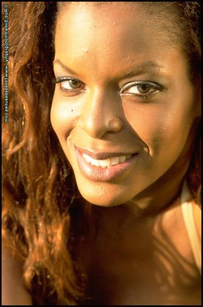 15P Ebony fitness model Roneique Banks poses in bikinis and lace lingerie