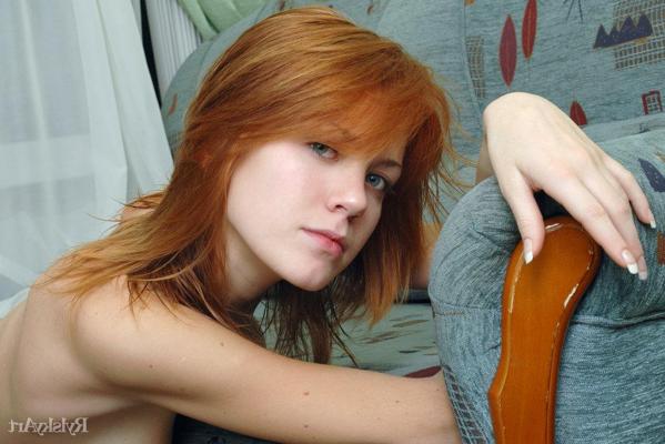 16P Redheaded young girl Itna hits upon great nude poses in stockings