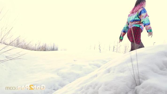 15P Solo girl with pink hair Aura takes a piss on snow-covered ground