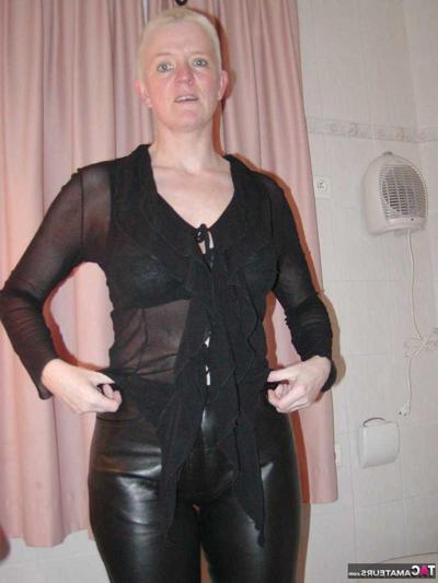 16P Older blonde woman Tiffany Pearl gets dressed after taking a bath