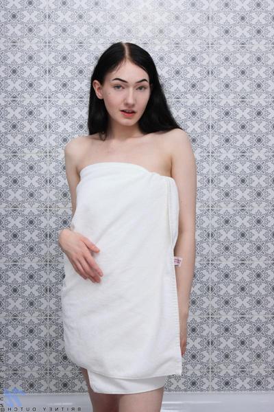16P Teen solo girl with long brunette hair Britney Dutch gets naked while bathing