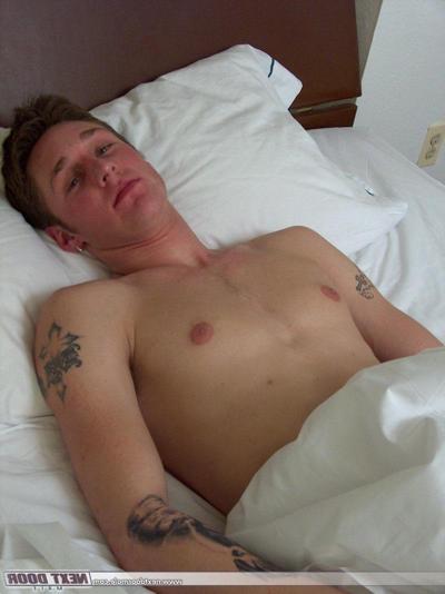 20P Tattooed gay stud Cody strips naked and shows off his hairy cock