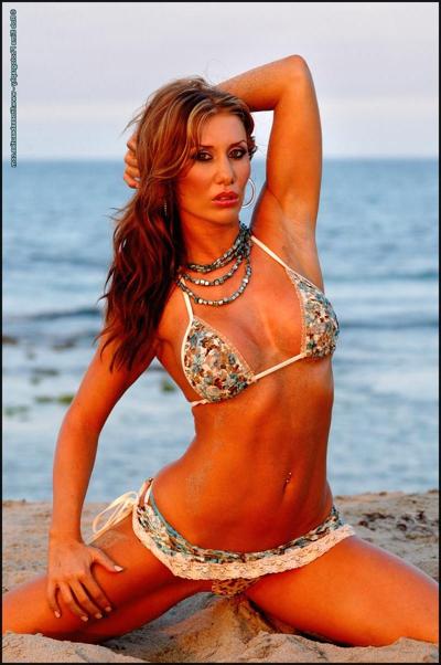 15P Fitness model Anca Marcus poses in the swimwear while at the ocean