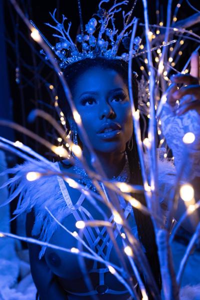 20P Glamorous ebony teen Kira Noir posing in an incredibly sexy snow queen outfit