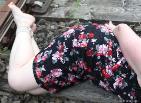 16P Natural redhead is left hog tied and gagged on railway tracks