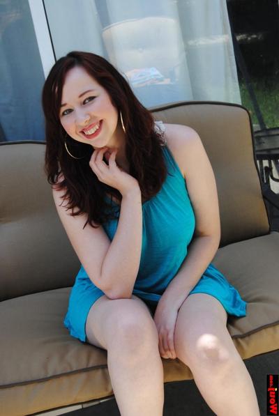 15P Chubby brunette amateur posing in her gorgeous blue dress on the sofa