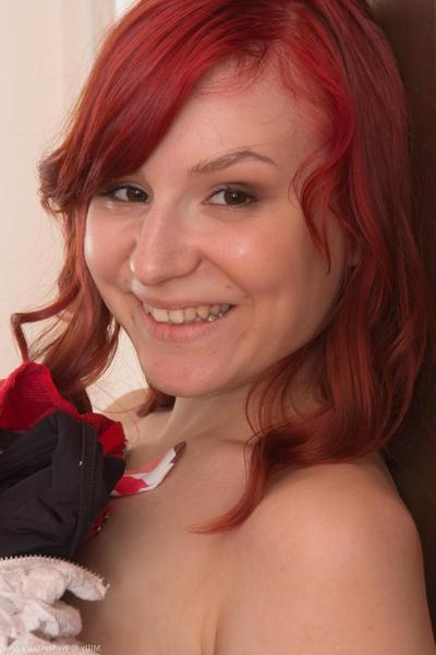 20P Amateur redhead Milly giving appetizing views of her sweet hairy pussy