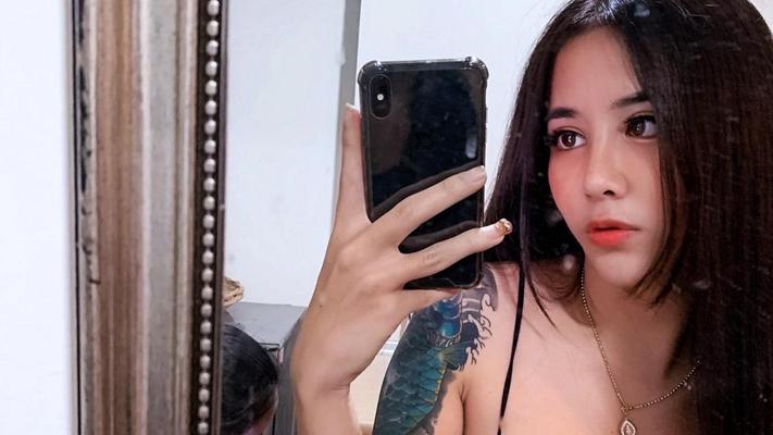 20P Pretty Asian shemale Nany displays her cleavage in her compilation